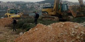 مستوطنون يجرفون أراضي جنوب نابلس
