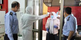 بالصور.. الشرطة تؤمن دخول 214 مواطنا في معبر الكرامة