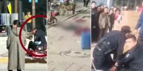 رجل يضرب زوجته حتى الموت في شارع مكتظ بالصين