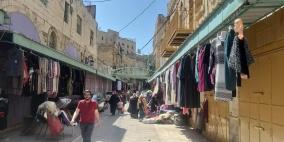 حركة تجارية "مشلولة" في البلدة القديمة بالخليل.. عشرات المحلات أغلقت أبوابها