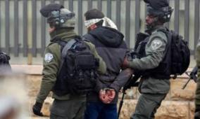 اعتقال مواطن والاعتداء على شقيقه في العيزرية شرق القدس