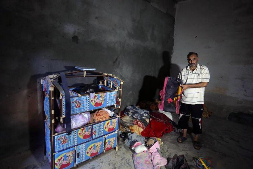 منزل عائلة ابو خماش الذي تعرض للقصف