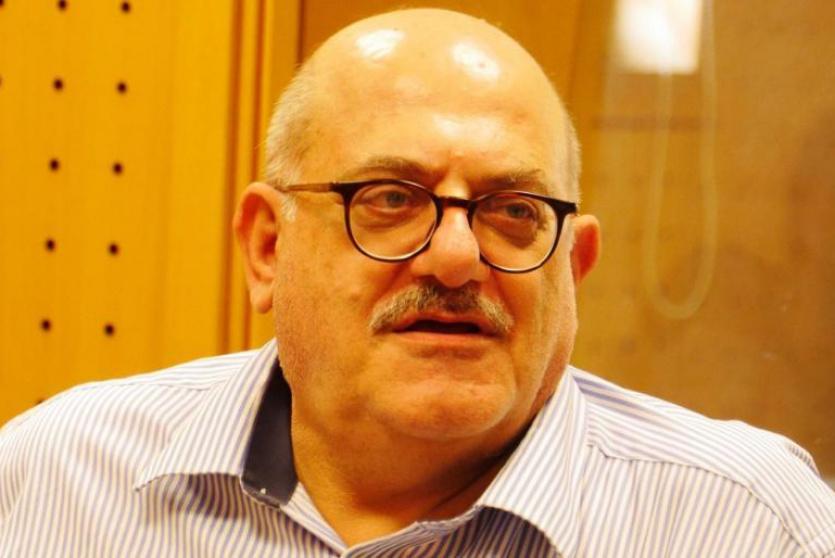 الكاتب والإعلامي عارف حجاوي