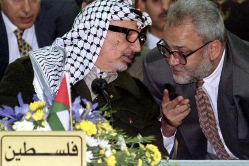 عريقات وياسر عرفات
