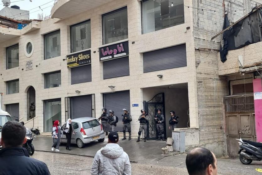من أمام منزل الشهيد اليوم
