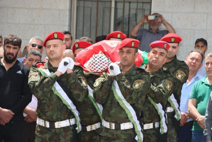 خلال تشييع جثمان الشهيد اليوم