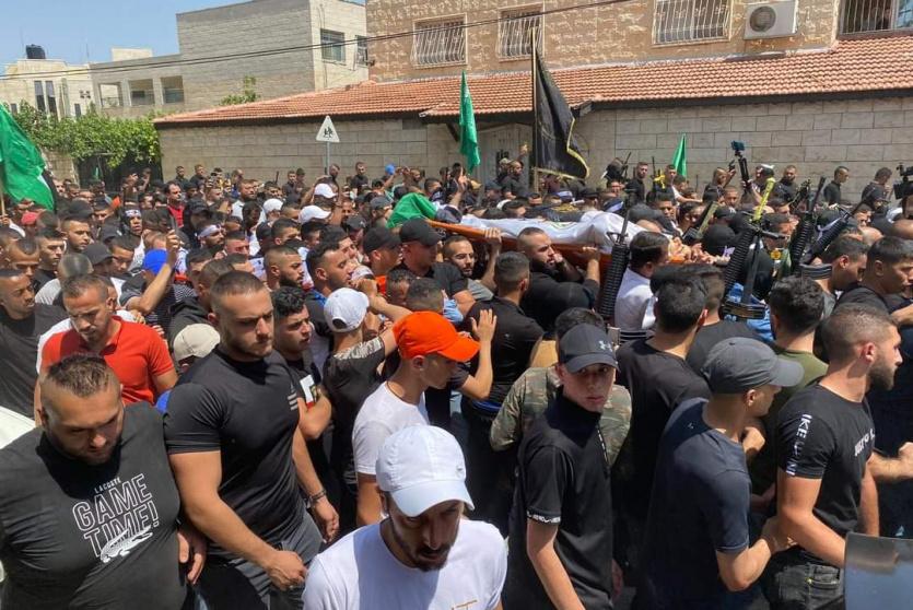 خلال تشييع جثمان الشهداء اليوم
