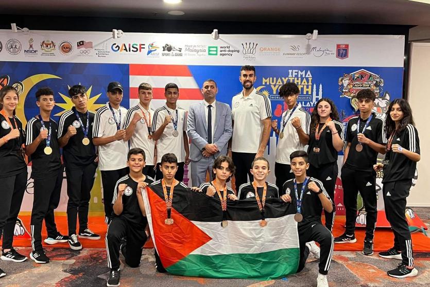 فلسطين تحصد 13 ميدالية ببطولتيّ العالم والأندية للعبة "المواي تاي" في ماليزيا