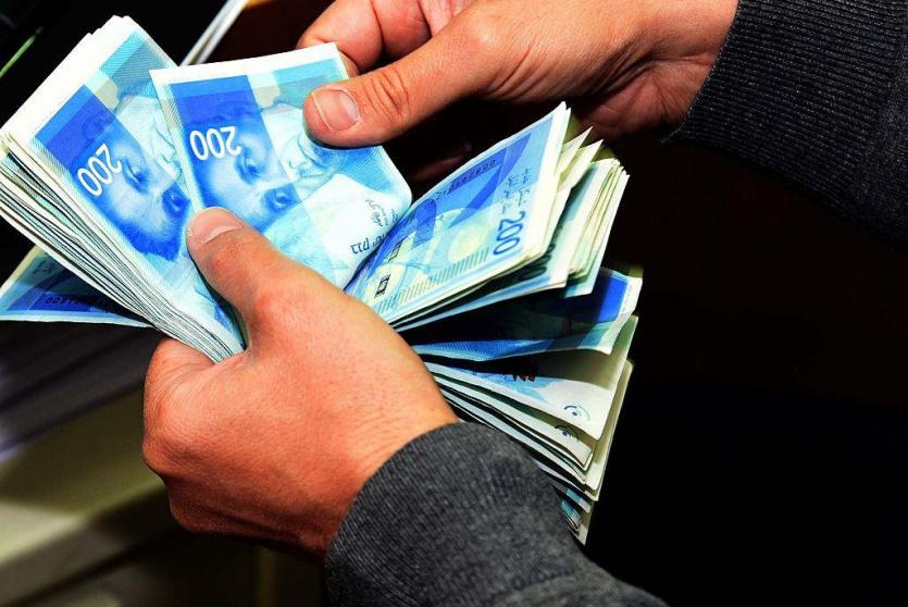 العملات - صرف الدولار مقابل الشيكل