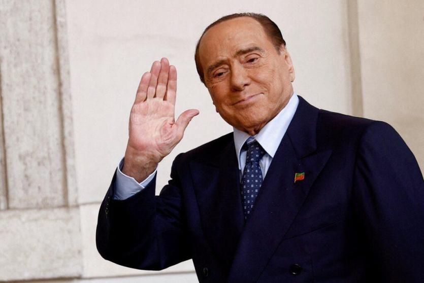 رئيس وزراء إيطاليا الأسبق برلسكوني